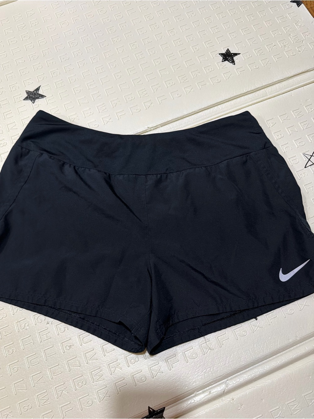 Nike Women's Black Athletic Shorts with White Swoosh